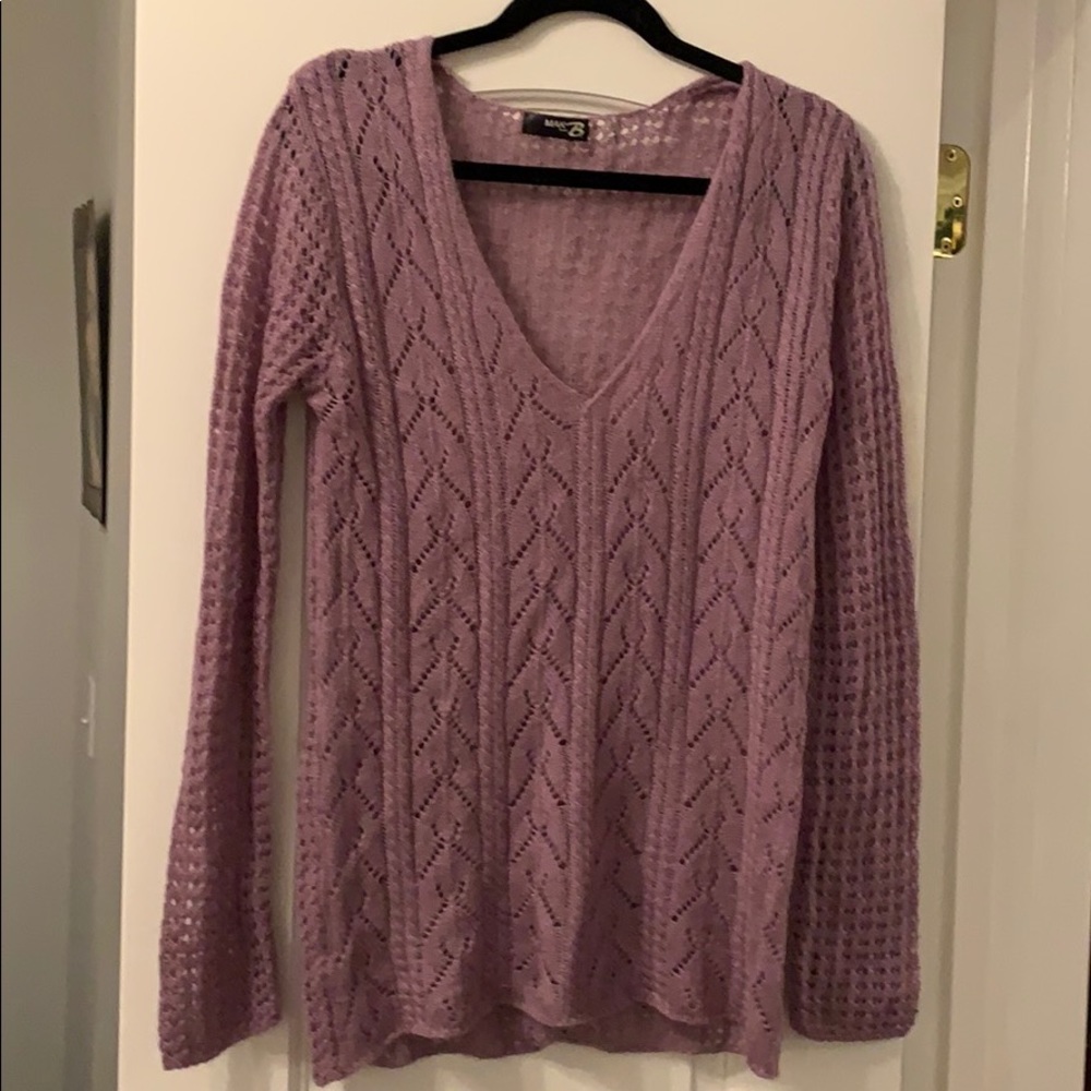 Large acrylic purple sweater.